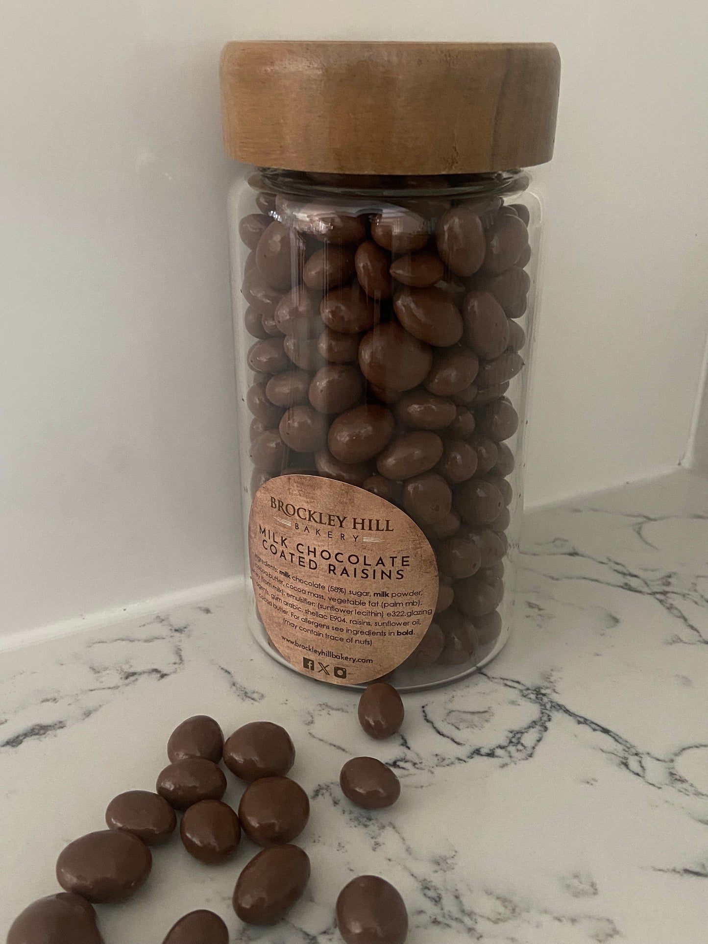 Milk Chocolate Coated Raisins in Glass Jar